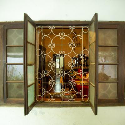 Wooden Window With Designed Grills1