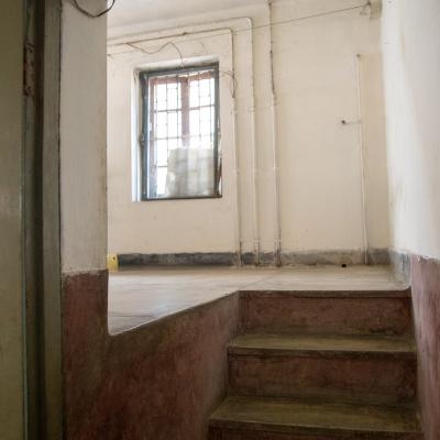 The Stairs To The Elevated Room Is Designed With Different Color Floor Material