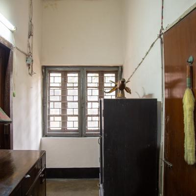 The Well Lit Corridor Space In Between Rooms