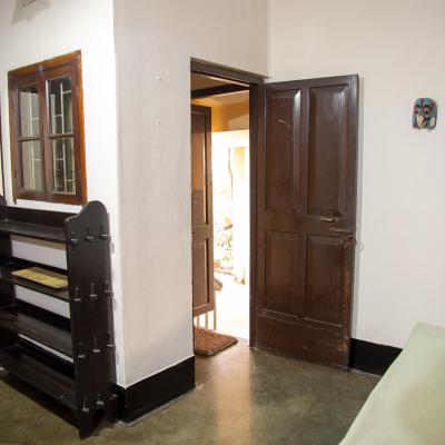 Wooden Bookshelf At The Entrance