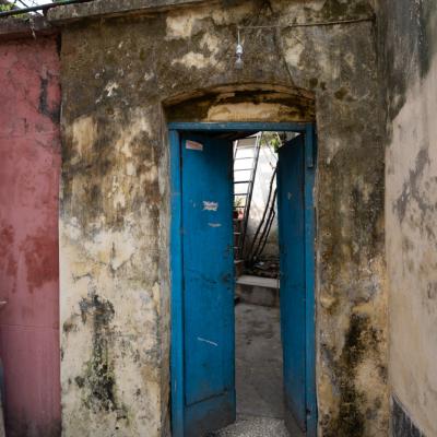 Access Through Wooden Door From Outdoor Complex