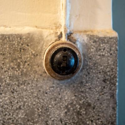 Vintage Switch At Bathroom Wall